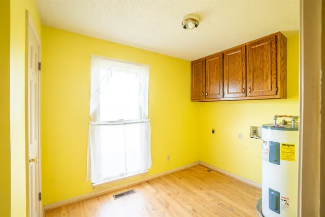 a view of a room with painted walls