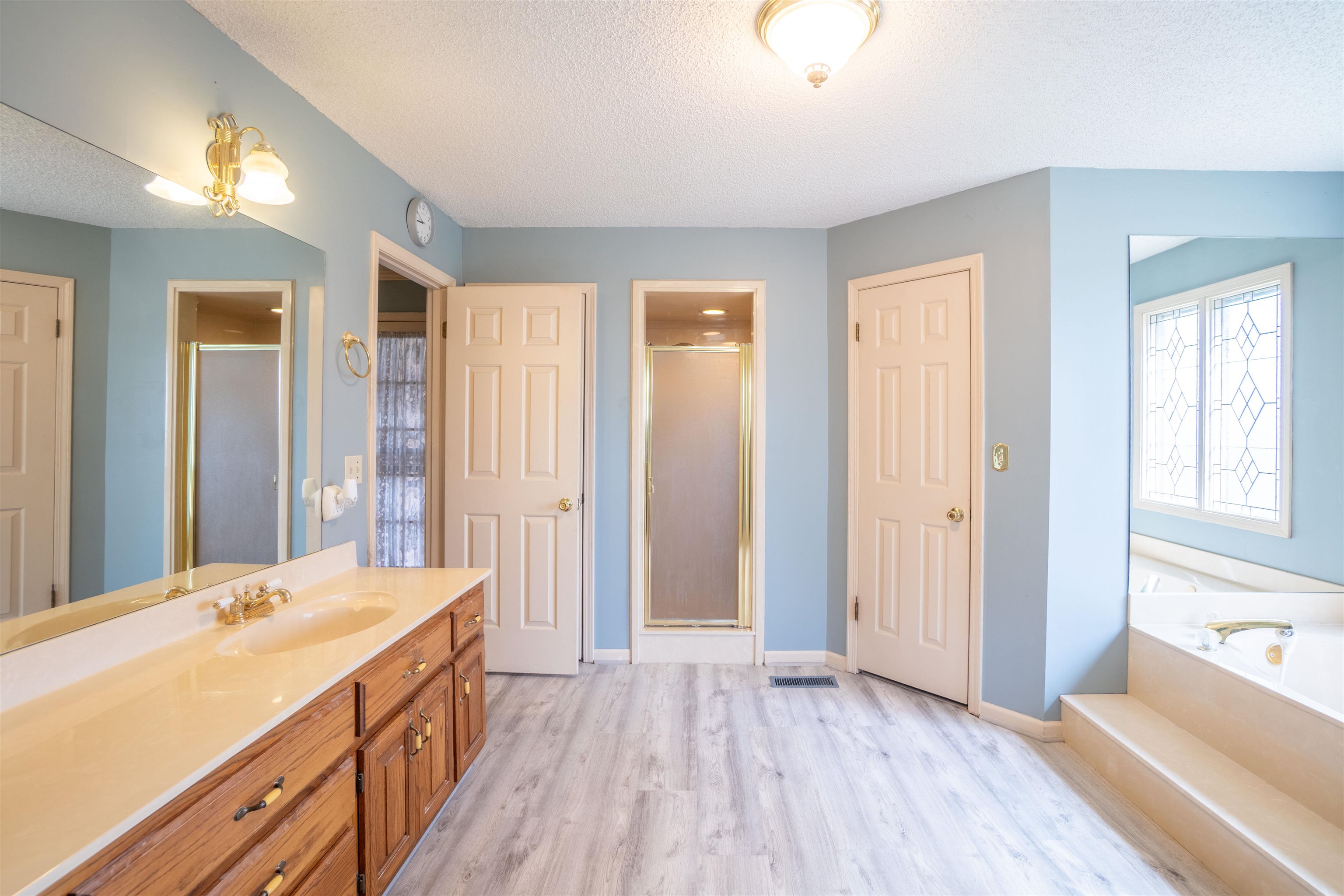 43 Hastings Way Covington, TN 38019 - Photo 21 of 21 a bathroom with a sink and a mirror
