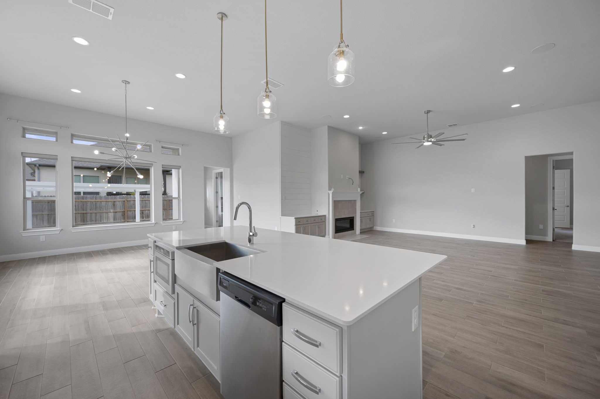 165 Eclipse Drive Austin, TX 78737 - Photo 17 of 38 a kitchen with a sink appliances and a counter top space