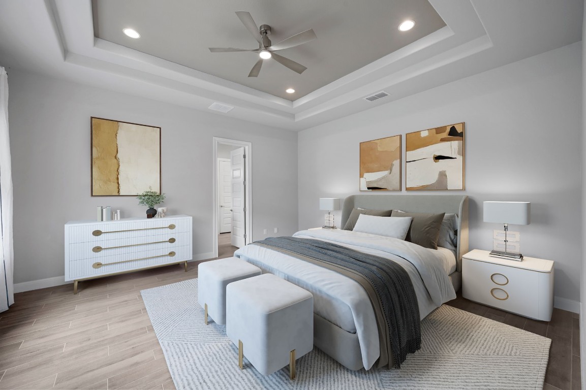 165 Eclipse Drive Austin, TX 78737 - Photo 20 of 38 a spacious bedroom with a bed and a couch