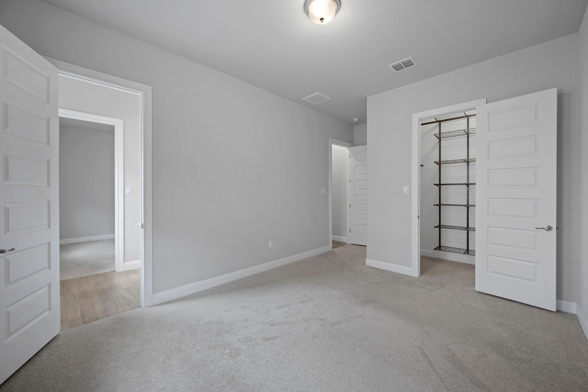 165 Eclipse Drive Austin, TX 78737 - Photo 26 of 38 an empty room with closet