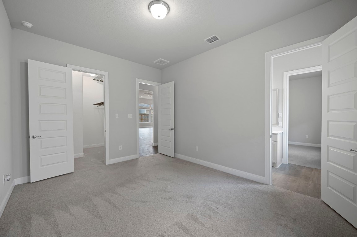 165 Eclipse Drive Austin, TX 78737 - Photo 29 of 38 an empty room with closet area