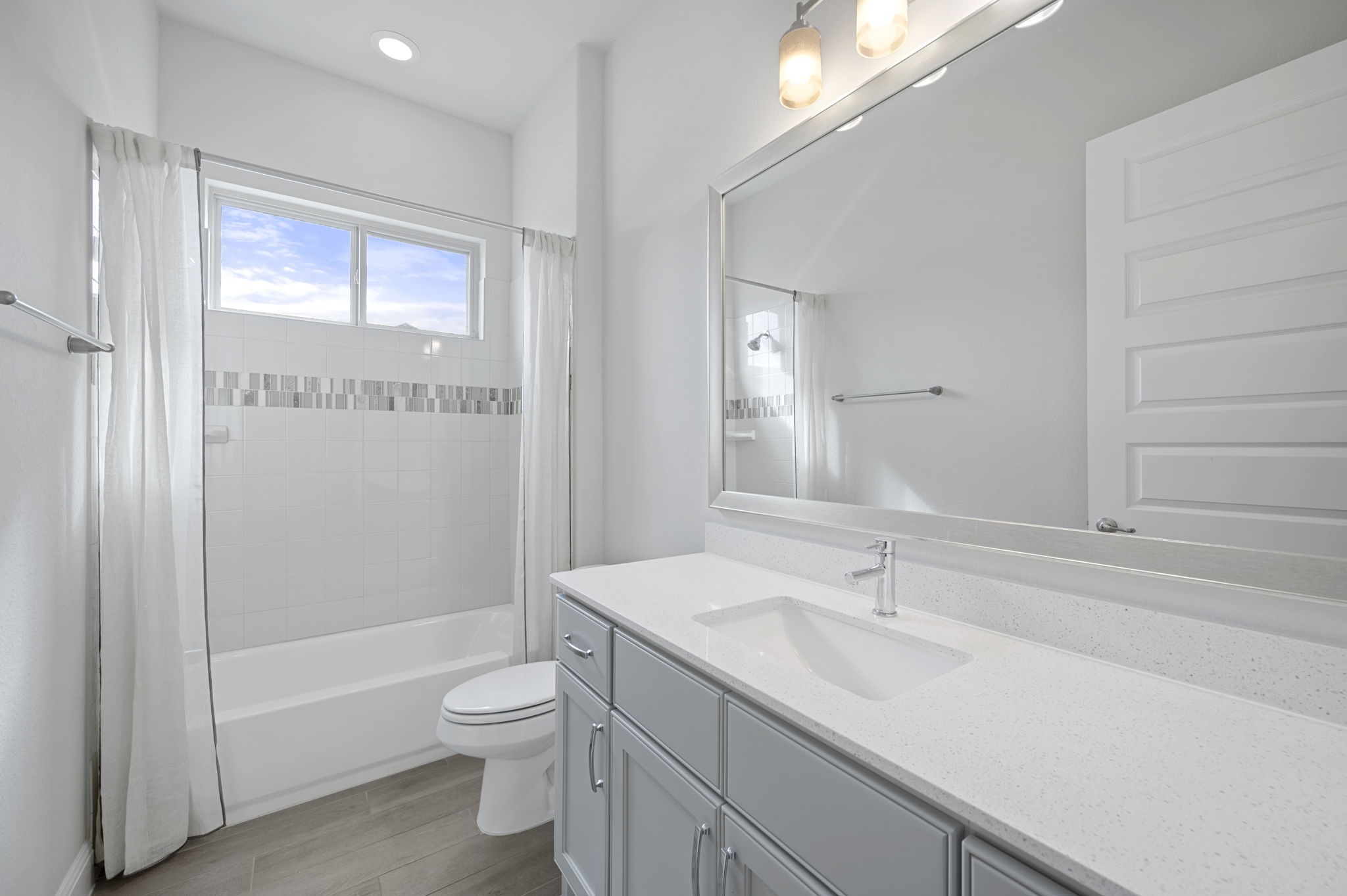 165 Eclipse Drive Austin, TX 78737 - Photo 30 of 38 a bathroom with a granite countertop sink a toilet and shower