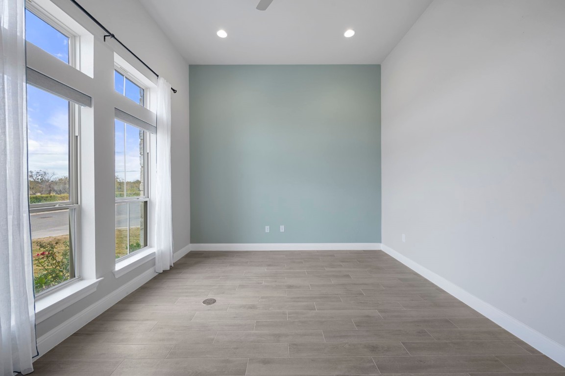 165 Eclipse Drive Austin, TX 78737 - Photo 7 of 38 a view of an empty room with a window