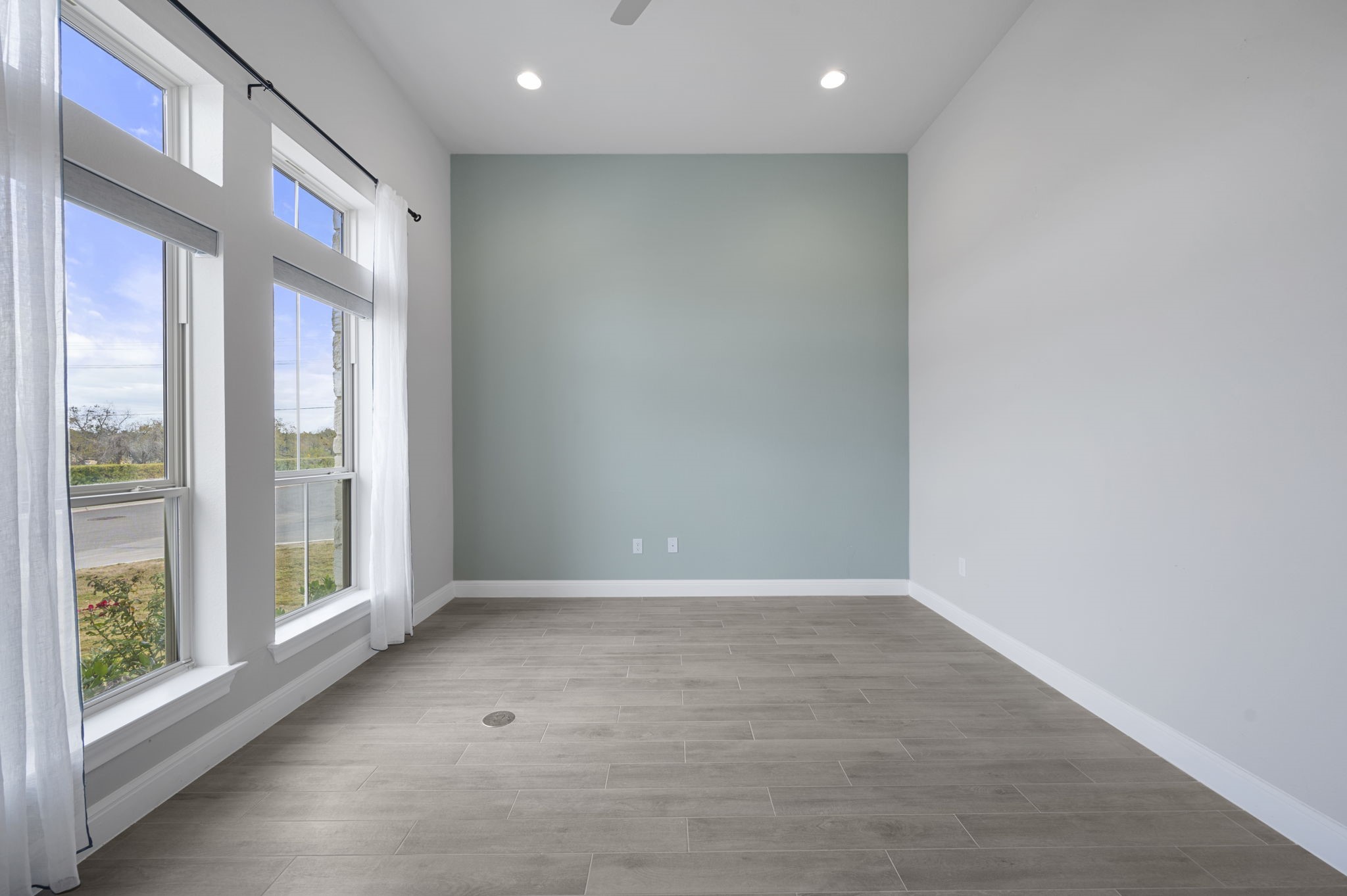 165 Eclipse Drive Austin, TX 78737 - Photo 7 of 38 a view of an empty room with a window