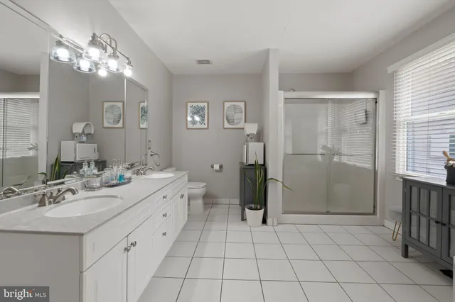 a living room with furniture and flat screen tv