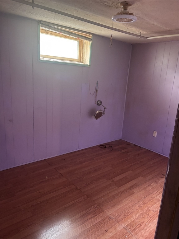 349 Oak Street Clinton, MA 01510 - Photo 8 of 9 a view of empty room with wooden floor