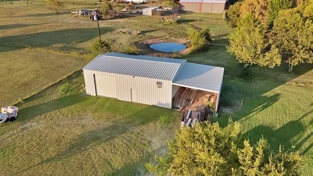 a house view with a lake