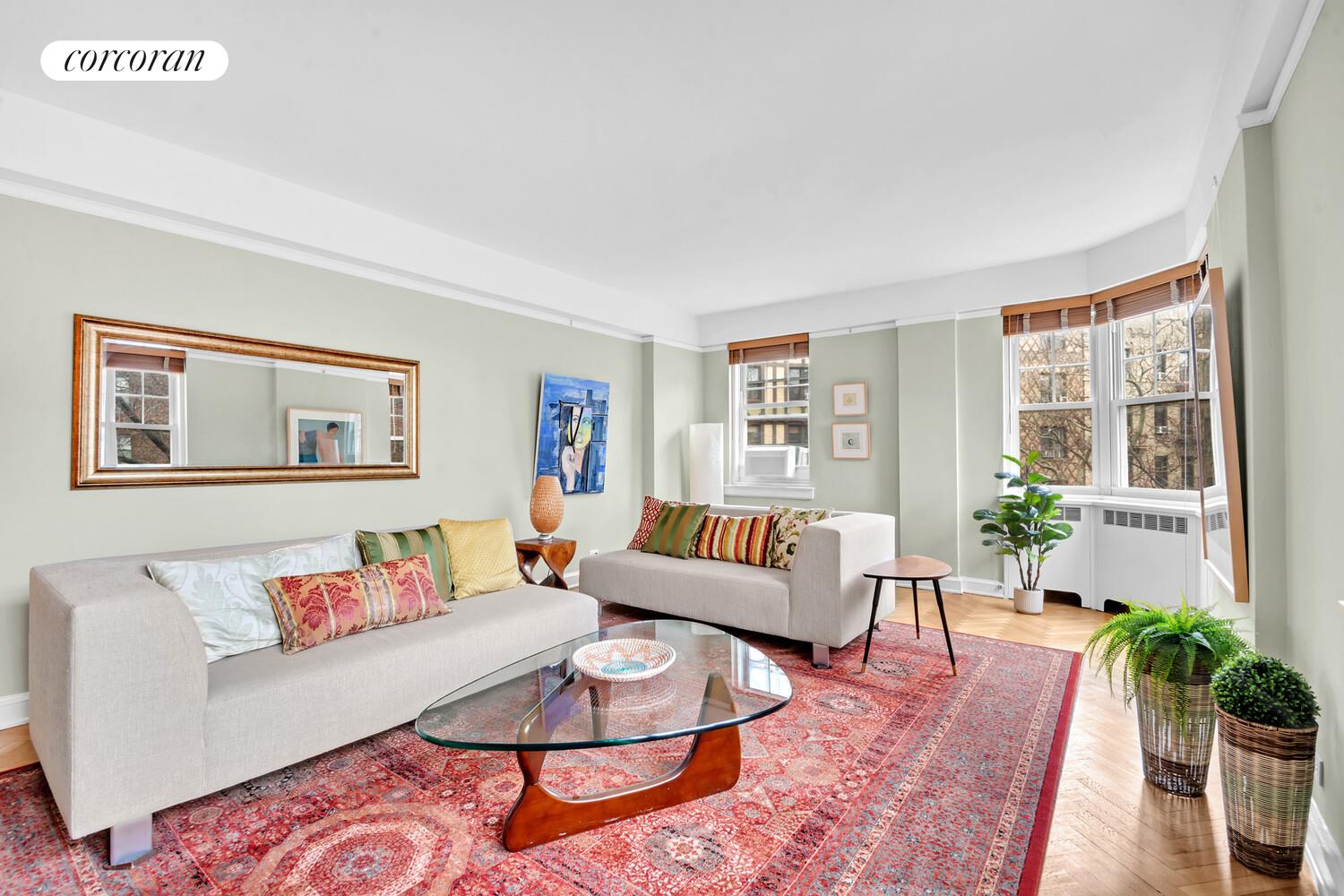 120 Cabrini Boulevard, Unit 44 Manhattan, NY 10033 - Photo 2 of 21 a living room with furniture and wooden floor