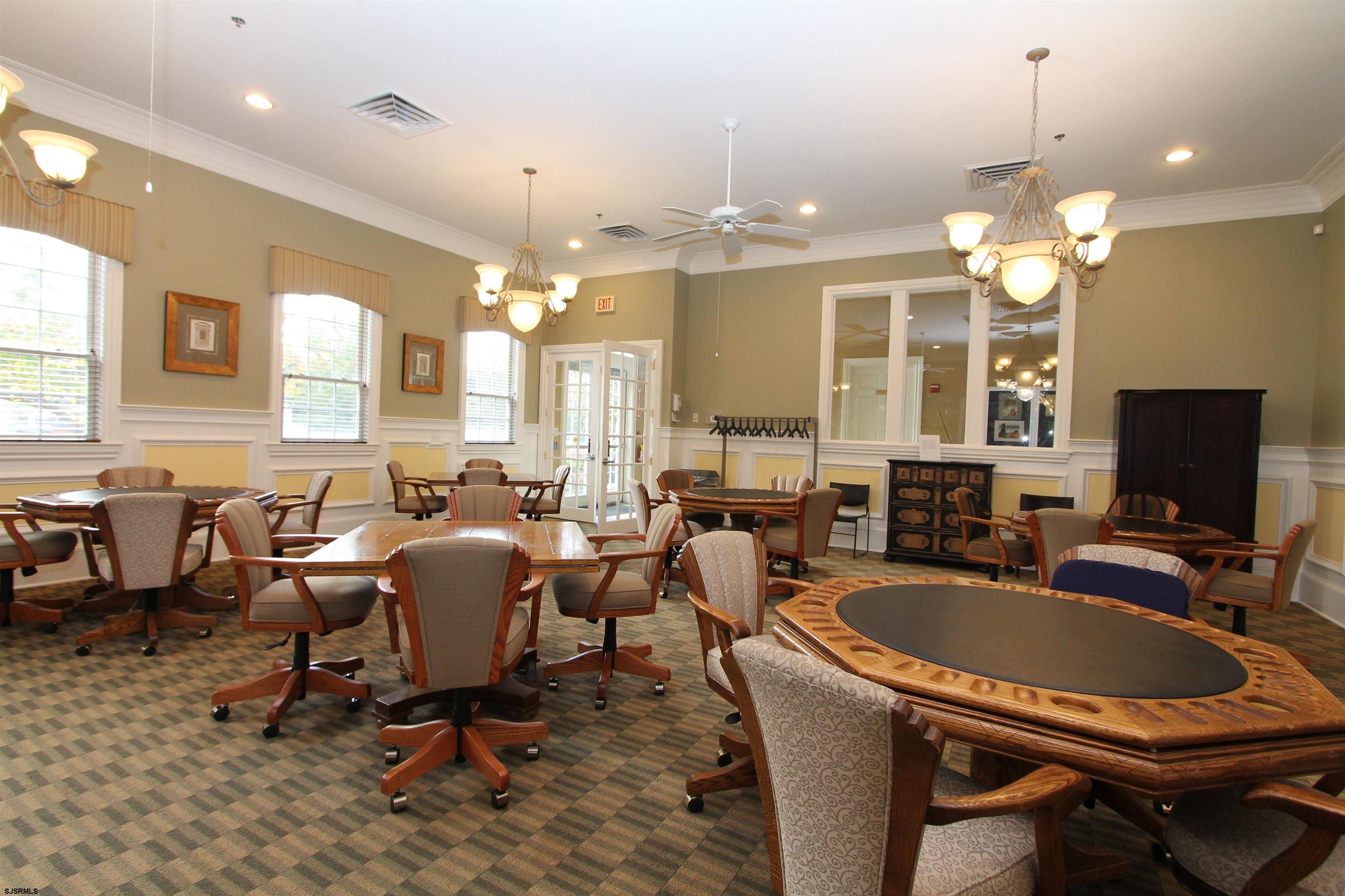 102 Warwick Road Galloway Township, NJ 08205 - Photo 28 of 45 a room with granite countertop lots of furniture and a chandelier