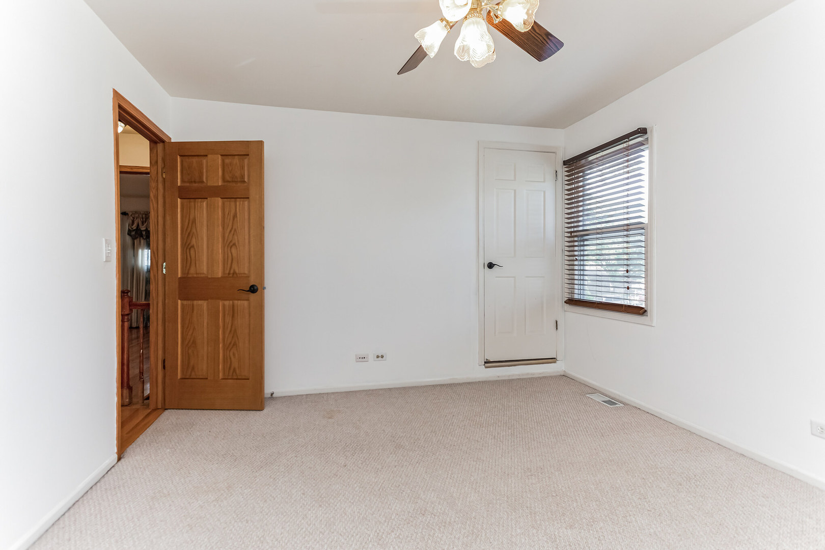 508 North Walnut Lane Schaumburg, IL 60107 - Photo 16 of 25 an empty room with windows