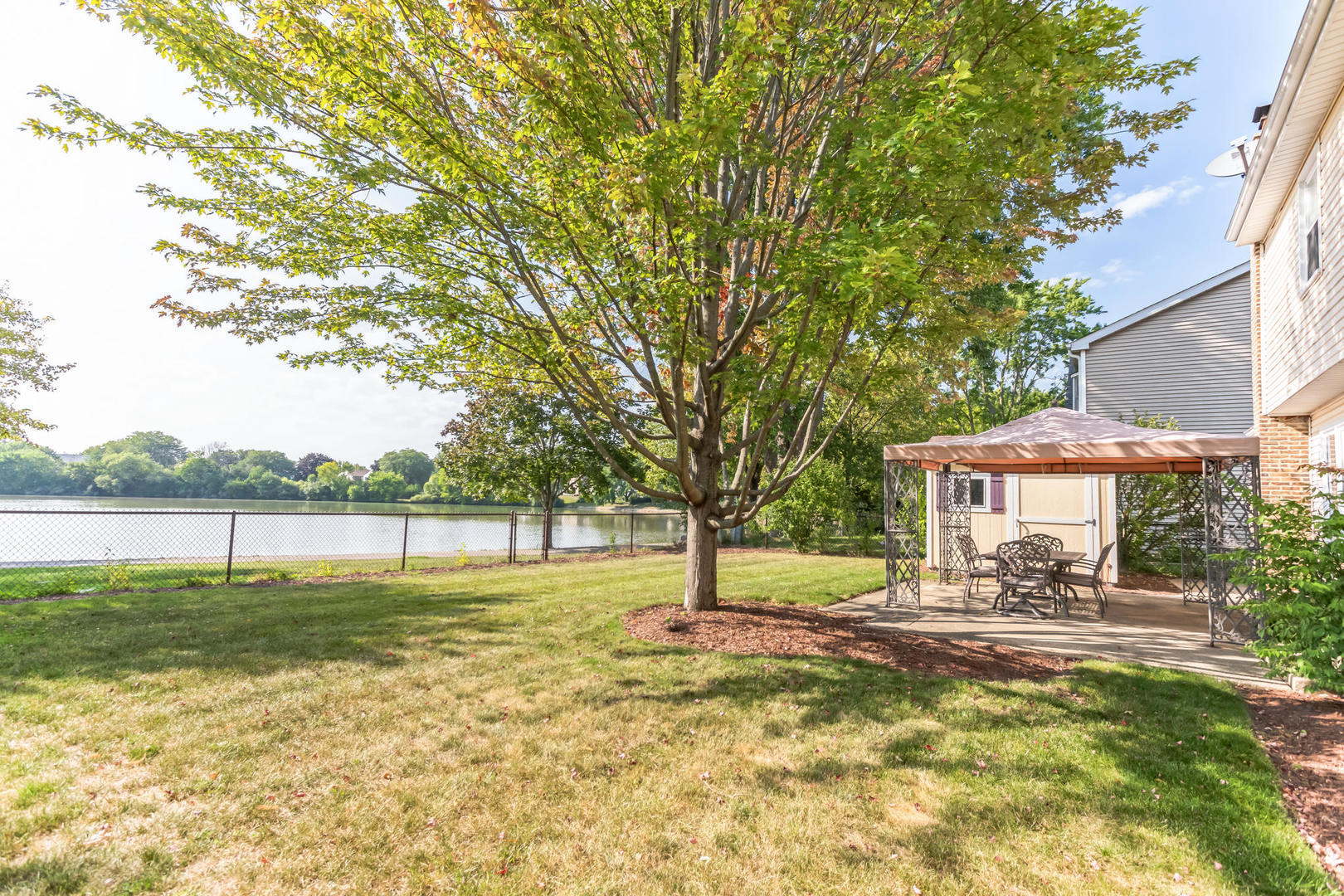 508 North Walnut Lane Schaumburg, IL 60107 - Photo 24 of 25 a swimming pool with outdoor seating and yard