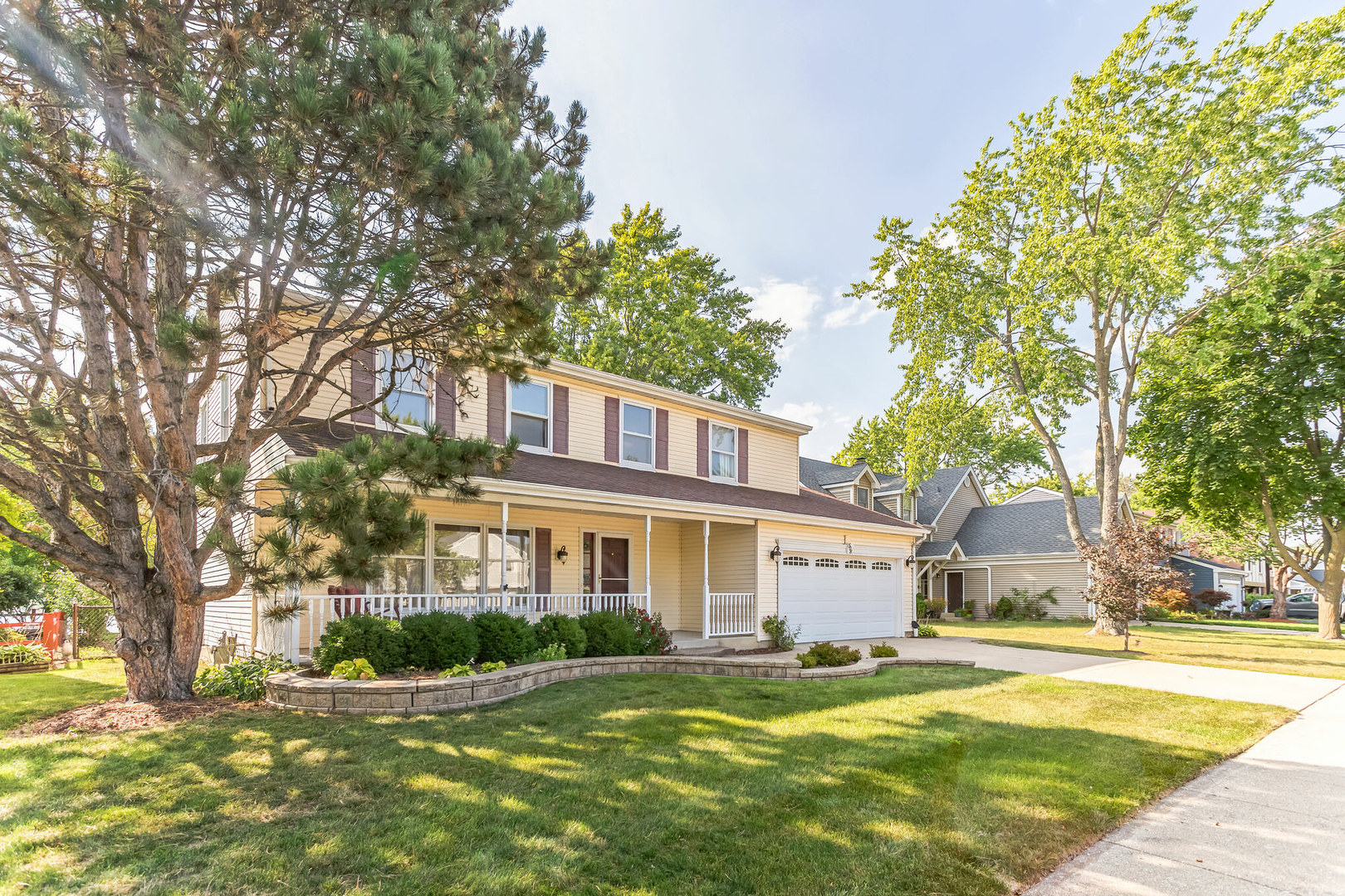 508 North Walnut Lane Schaumburg, IL 60107 - Photo 3 of 25 a view of a residential houses with yard and tree s