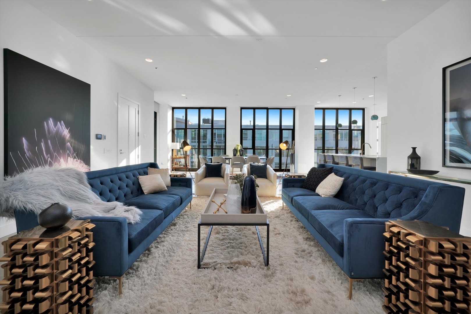 900 West Washington Boulevard, Unit 701 Chicago, IL 60607 - Photo 10 of 24 a living room with furniture or couch and a flat screen tv
