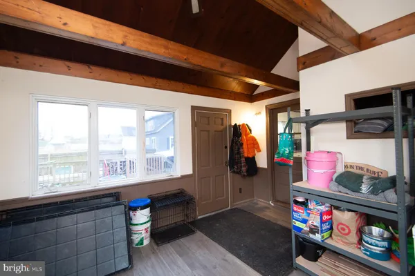 a room with furniture and a window