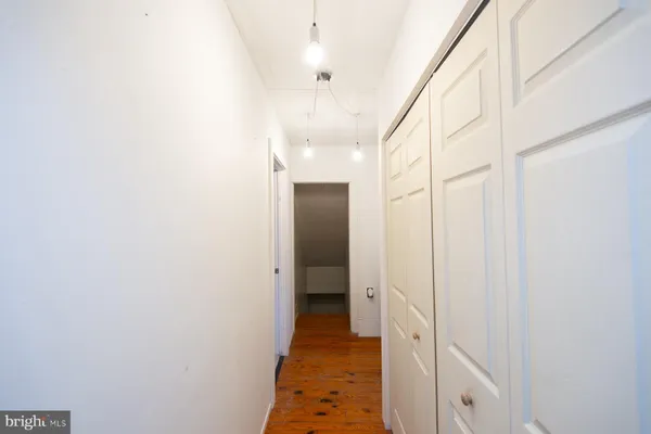 a view of a hallway with hallway