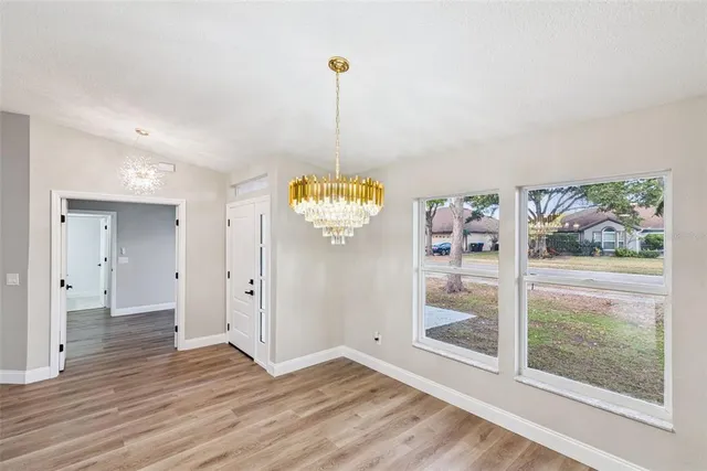 a view of a house with a swimming pool