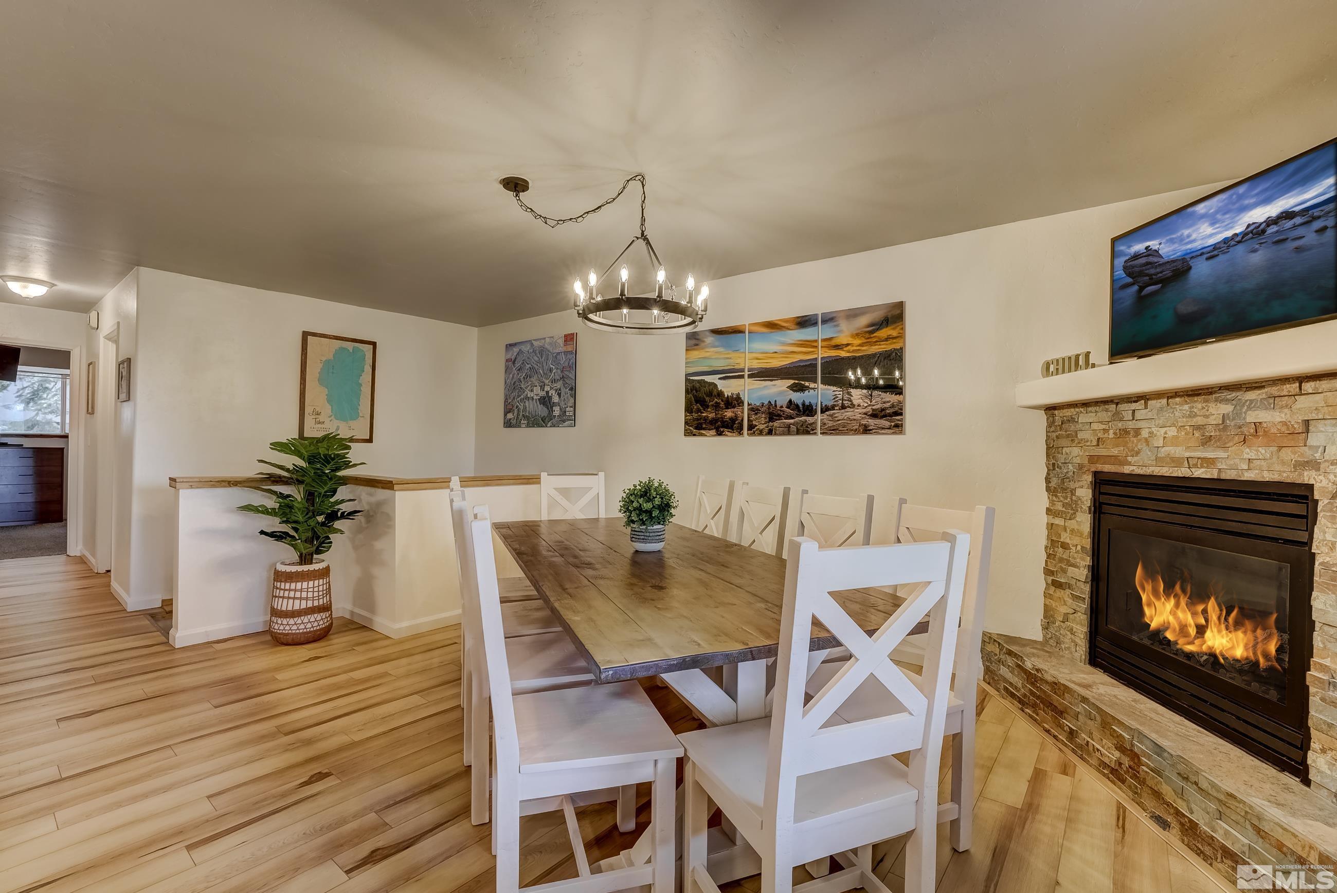 758 Milky Way Court, Unit B Stateline, NV 89449 - Photo 2 of 36 a dining room with furniture window and wooden floor