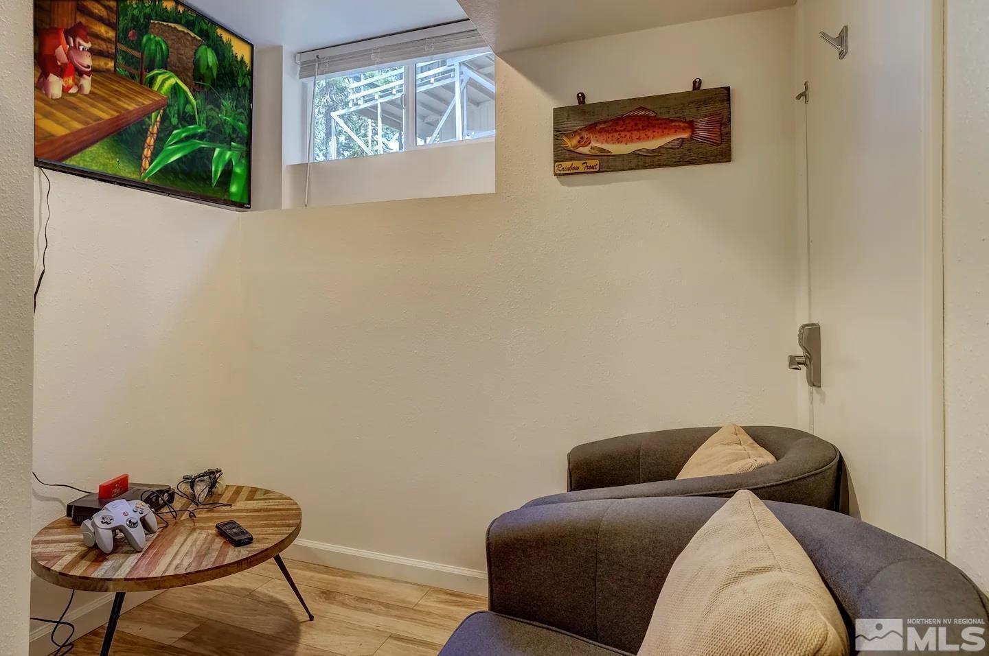 758 Milky Way Court, Unit B Stateline, NV 89449 - Photo 23 of 36 a bedroom with a bed and a painting on the wall