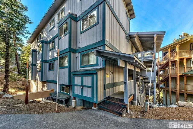 a view of buildings with a street