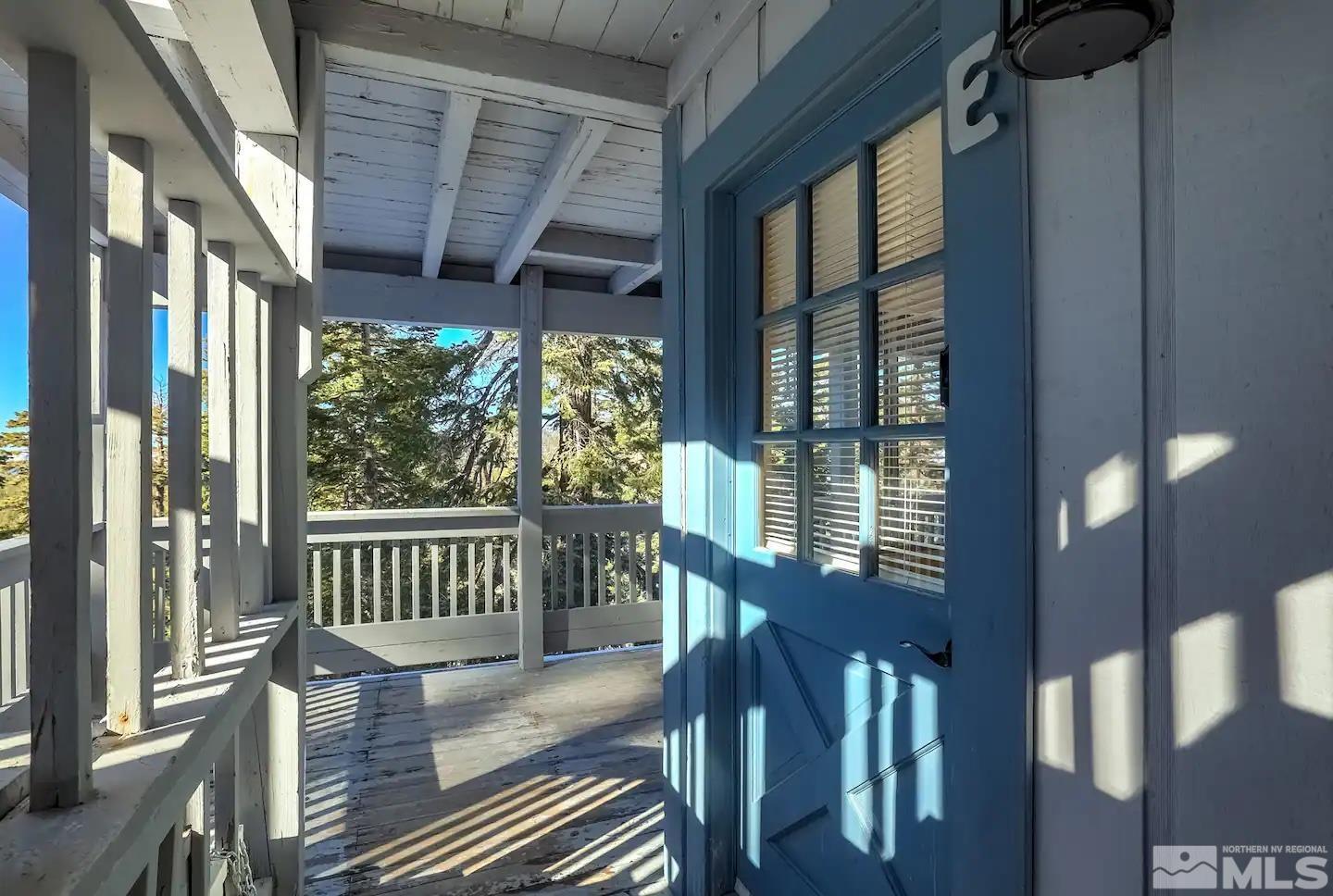 758 Milky Way Court, Unit B Stateline, NV 89449 - Photo 34 of 36 a view of a porch with wooden floor