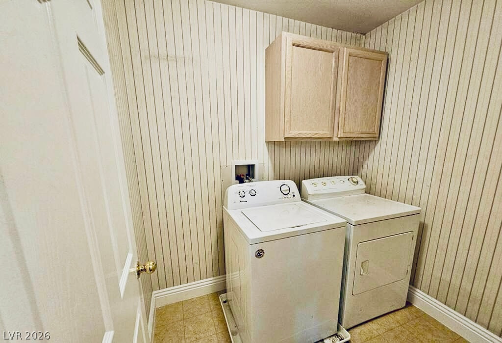 5953 Crumbling Ridge Street Henderson, NV 89011 - Photo 24 of 42 A dedicated laundry space provides practical convenience for daily chores.