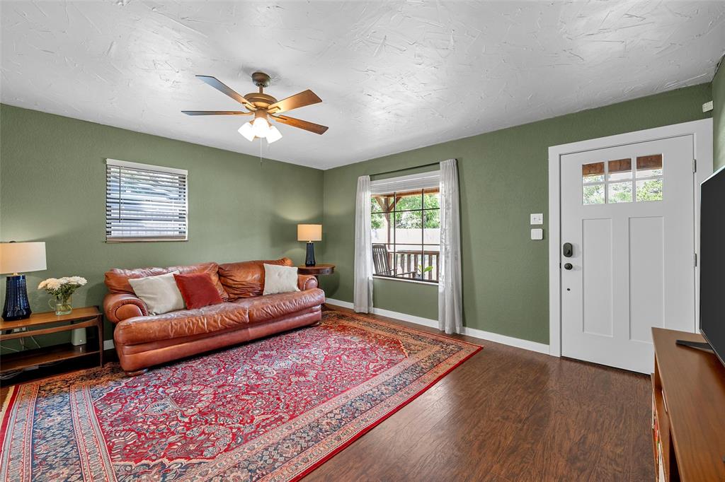 3000 North 15th A Street Waco, TX 76708 - Photo 6 of 24 a living room with furniture and a rug