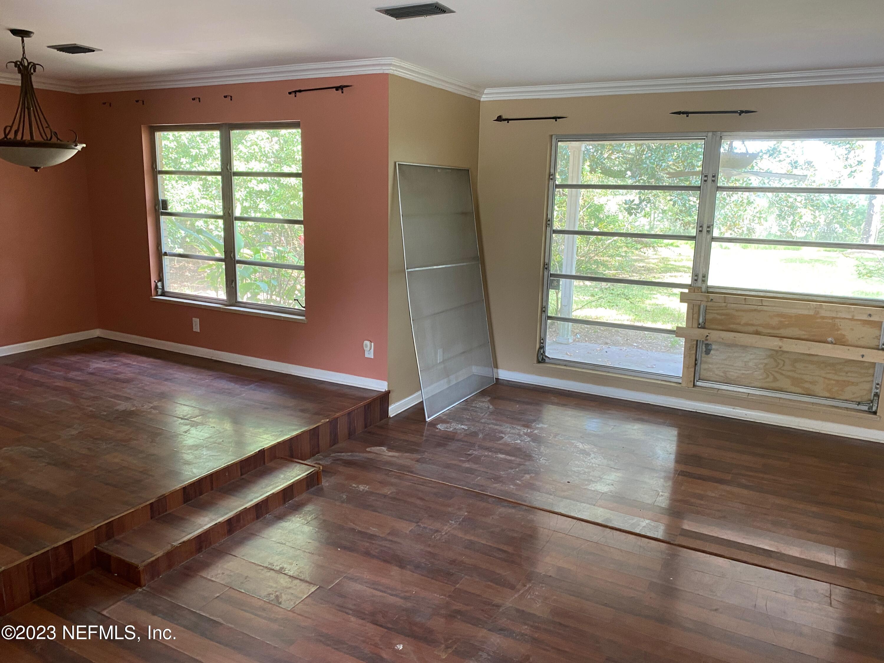 2827 Ribault Scenic Drive Jacksonville, FL 32208 - Photo 10 of 24 a view of an empty room with a window