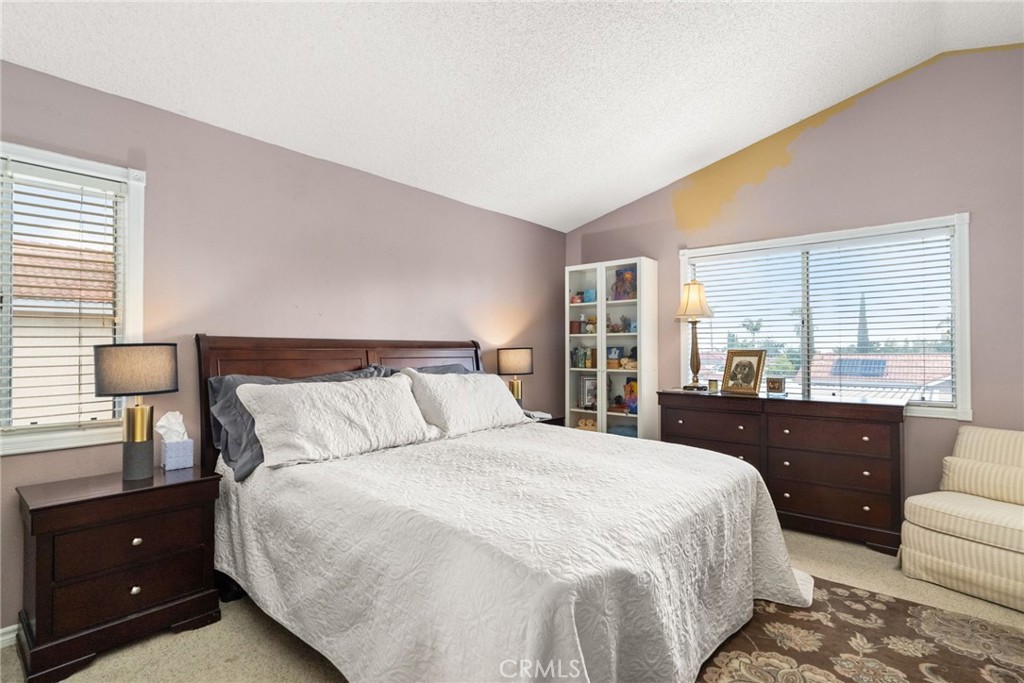 19422 Totem Court Riverside, CA 92508 - Photo 18 of 44 a bedroom with a bed and a lamp