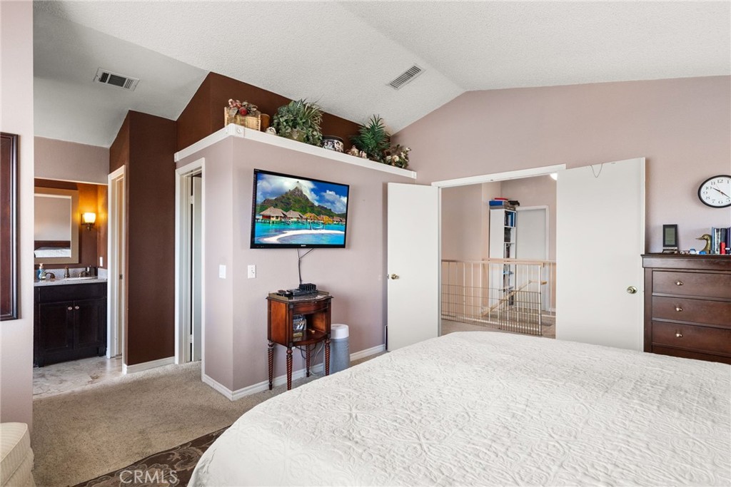 19422 Totem Court Riverside, CA 92508 - Photo 19 of 44 a bedroom with a bed and a television
