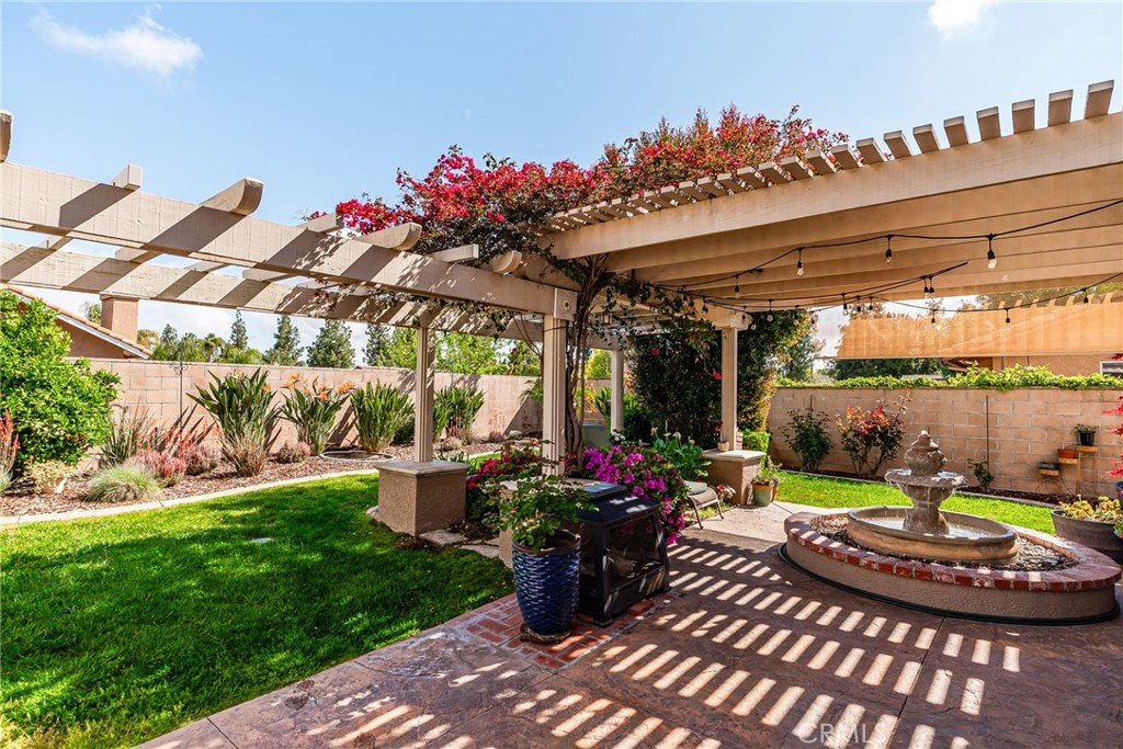 19422 Totem Court Riverside, CA 92508 - Photo 35 of 44 a view of a chairs and table in backyard