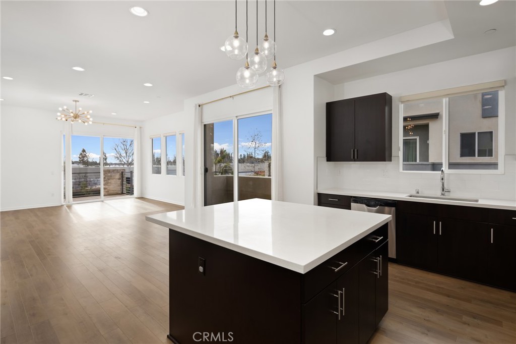 370 Broadway Drive Brea, CA 92821 - Photo 19 of 32 a large kitchen with stainless steel appliances a large island in the center
