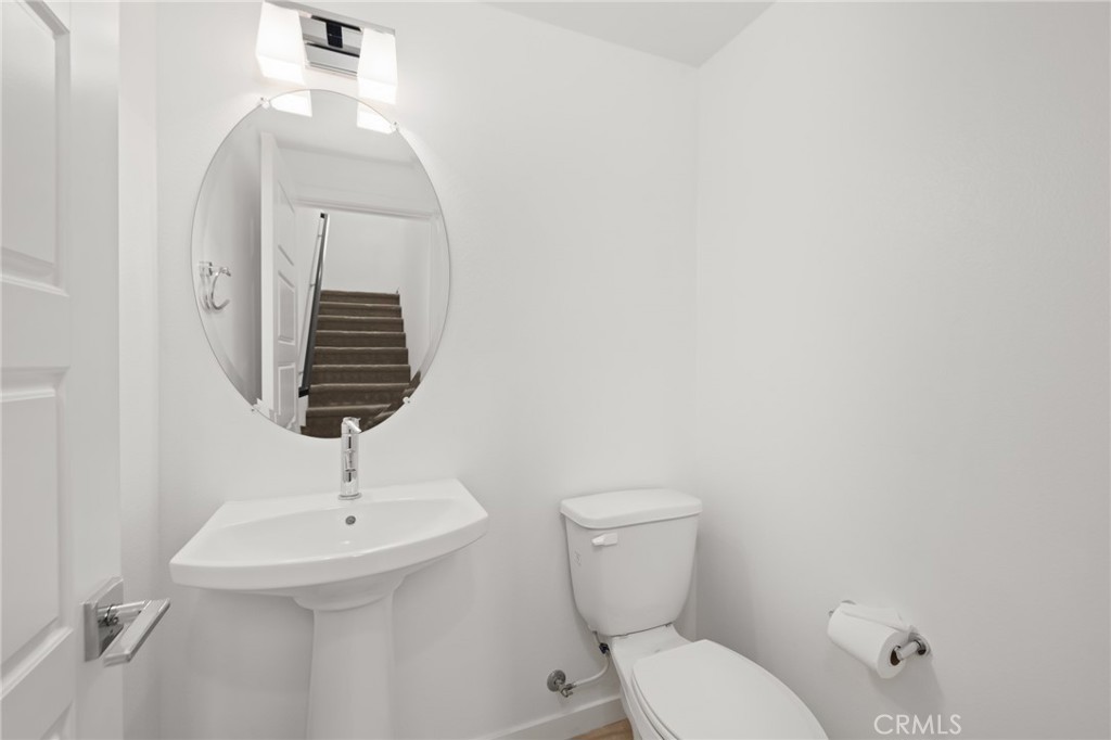 370 Broadway Drive Brea, CA 92821 - Photo 21 of 32 a bathroom with a toilet sink and mirror