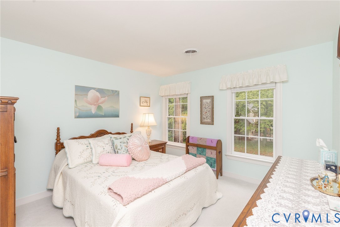 5724 Grove Forest Road Midlothian, VA 23112 - Photo 31 of 47 Bright bedroom featuring two large windows with wh