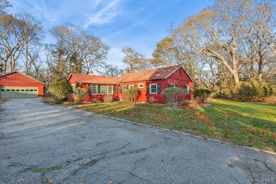 a view of house with outdoor space and street view
