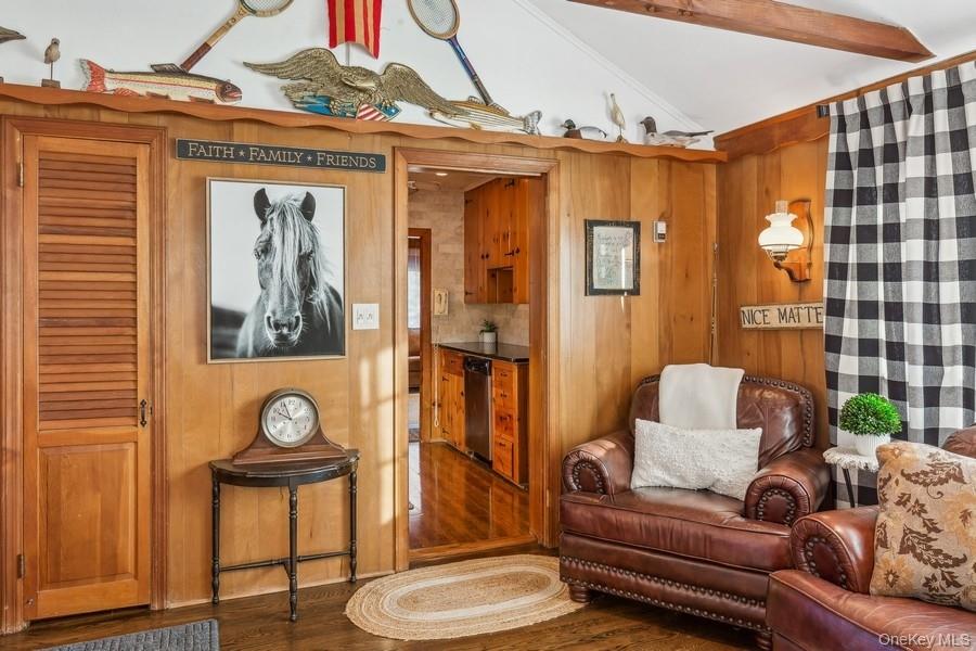 1850 Sterling Road Cutchogue, NY 11935 - Photo 16 of 28 a living room with furniture and a painting on the wall