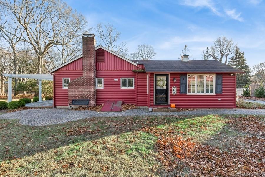 1850 Sterling Road Cutchogue, NY 11935 - Photo 10 of 28 a view of a house with a yard