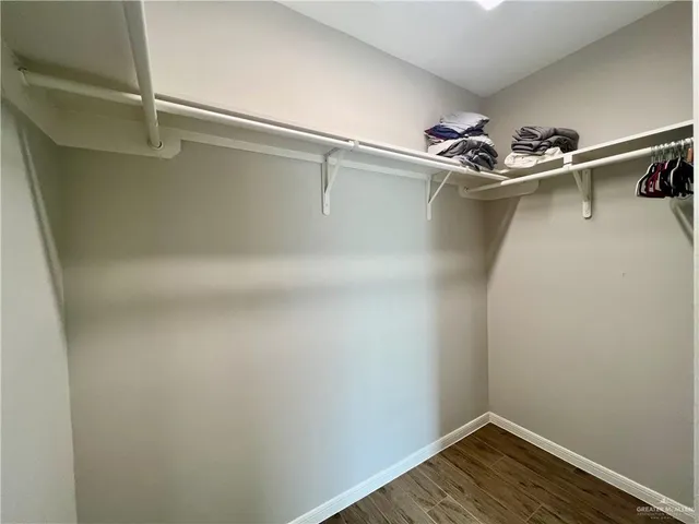 a view of a room with racks on the wall