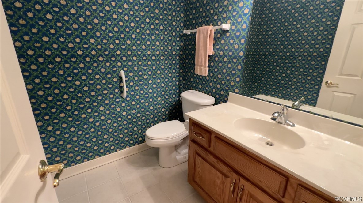 12610 Lilking Road Chester, VA 23831 - Photo 38 of 50 a bathroom with a sink and a toilet