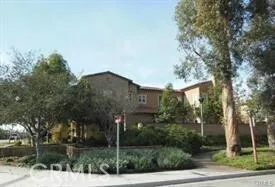 a front view of a house with outdoor space