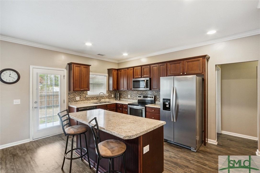 205 Sterling Drive Rincon, GA 31326 - Photo 11 of 43 Beautiful bright kitchen with natural lighting