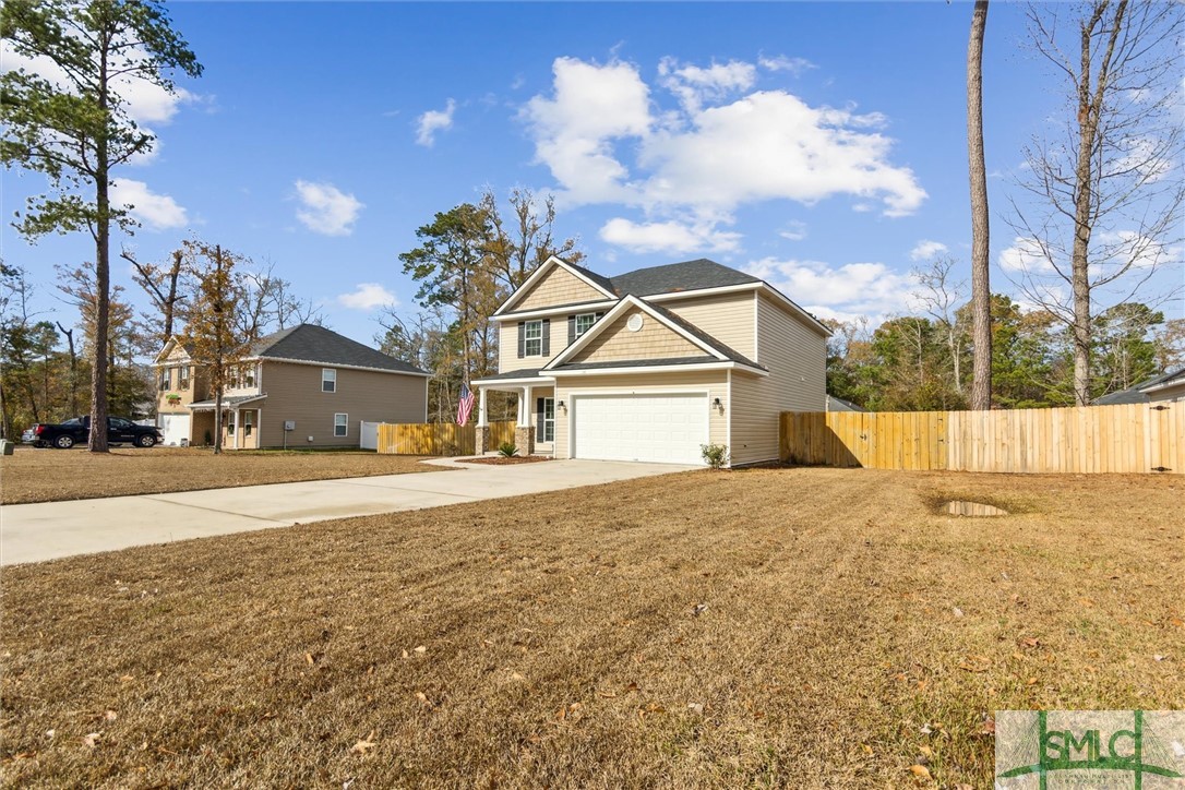 205 Sterling Drive Rincon, GA 31326 - Photo 4 of 43 Exterior front with side yard view