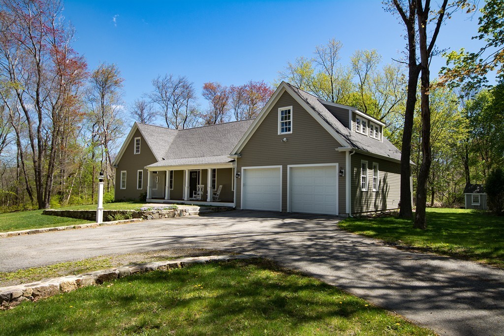 158 First Parish Road Scituate, MA 02066 - Photo 1 of 27 a front view of a house with a yard