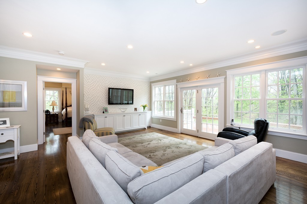 158 First Parish Road Scituate, MA 02066 - Photo 14 of 27 a living room with furniture flat screen tv and a large window