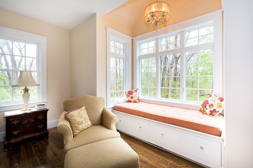 158 First Parish Road Scituate, MA 02066 - Photo 19 of 27 a living room with furniture and a large window