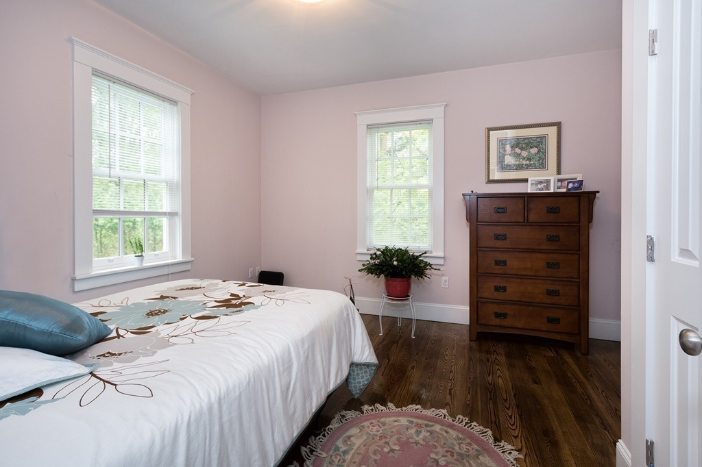 158 First Parish Road Scituate, MA 02066 - Photo 21 of 27 a bedroom with a bed and a window