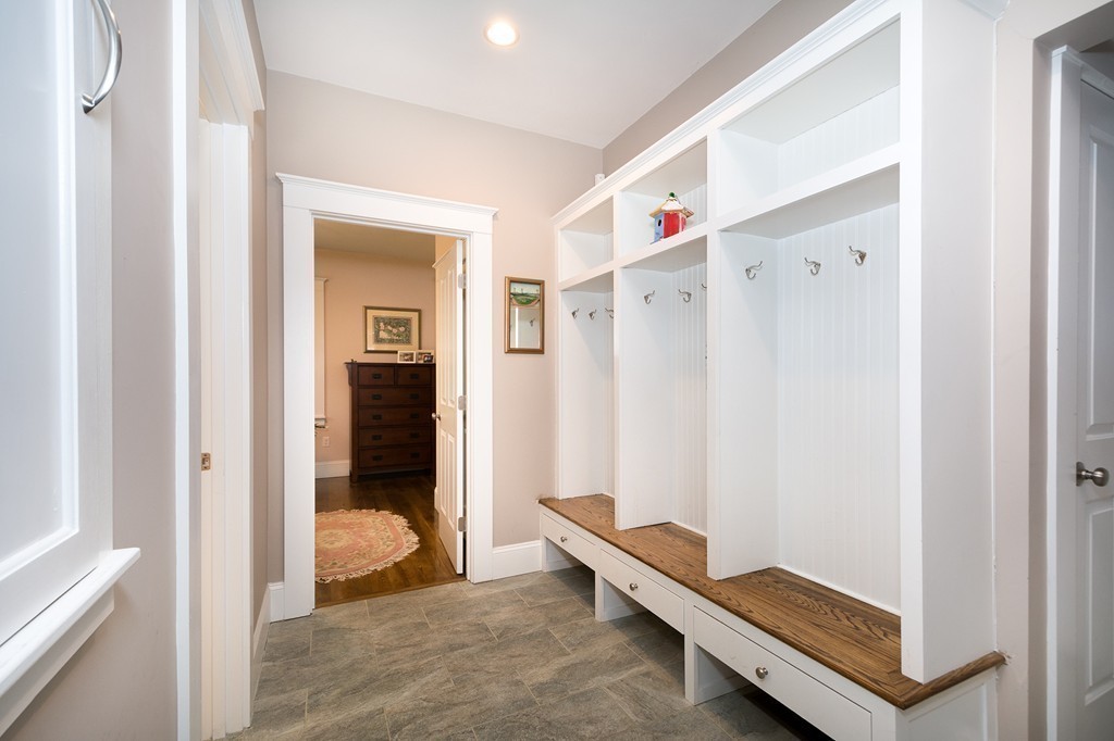 158 First Parish Road Scituate, MA 02066 - Photo 23 of 27 a living room with a bed and a window