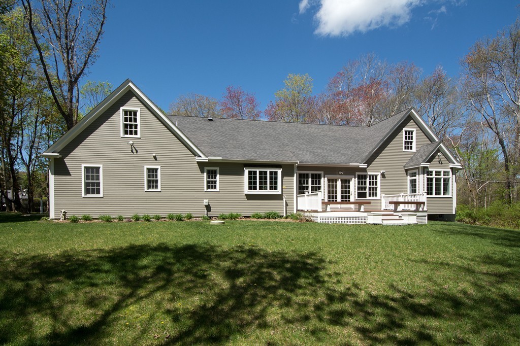 158 First Parish Road Scituate, MA 02066 - Photo 24 of 27 a front view of a house with a yard