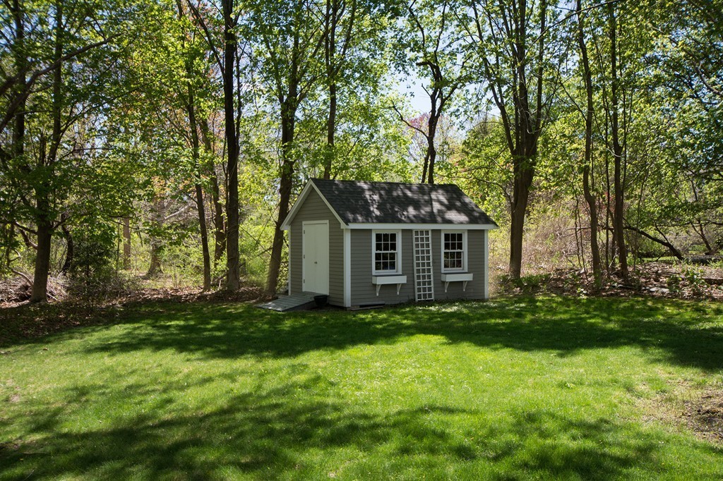 158 First Parish Road Scituate, MA 02066 - Photo 26 of 27 a front view of a house with a yard