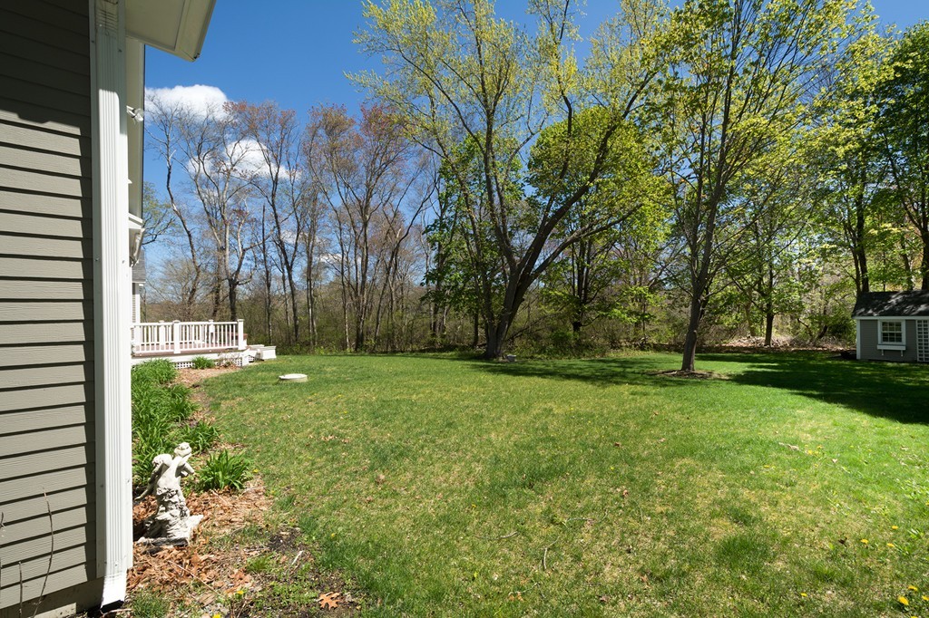 158 First Parish Road Scituate, MA 02066 - Photo 27 of 27 a view of backyard with tree